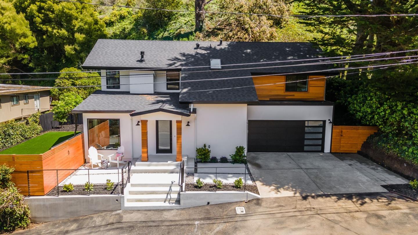 311 Keith Avenue Pacifica, CA 94044 - Photo 33 of 40 a front view of a house with a garden