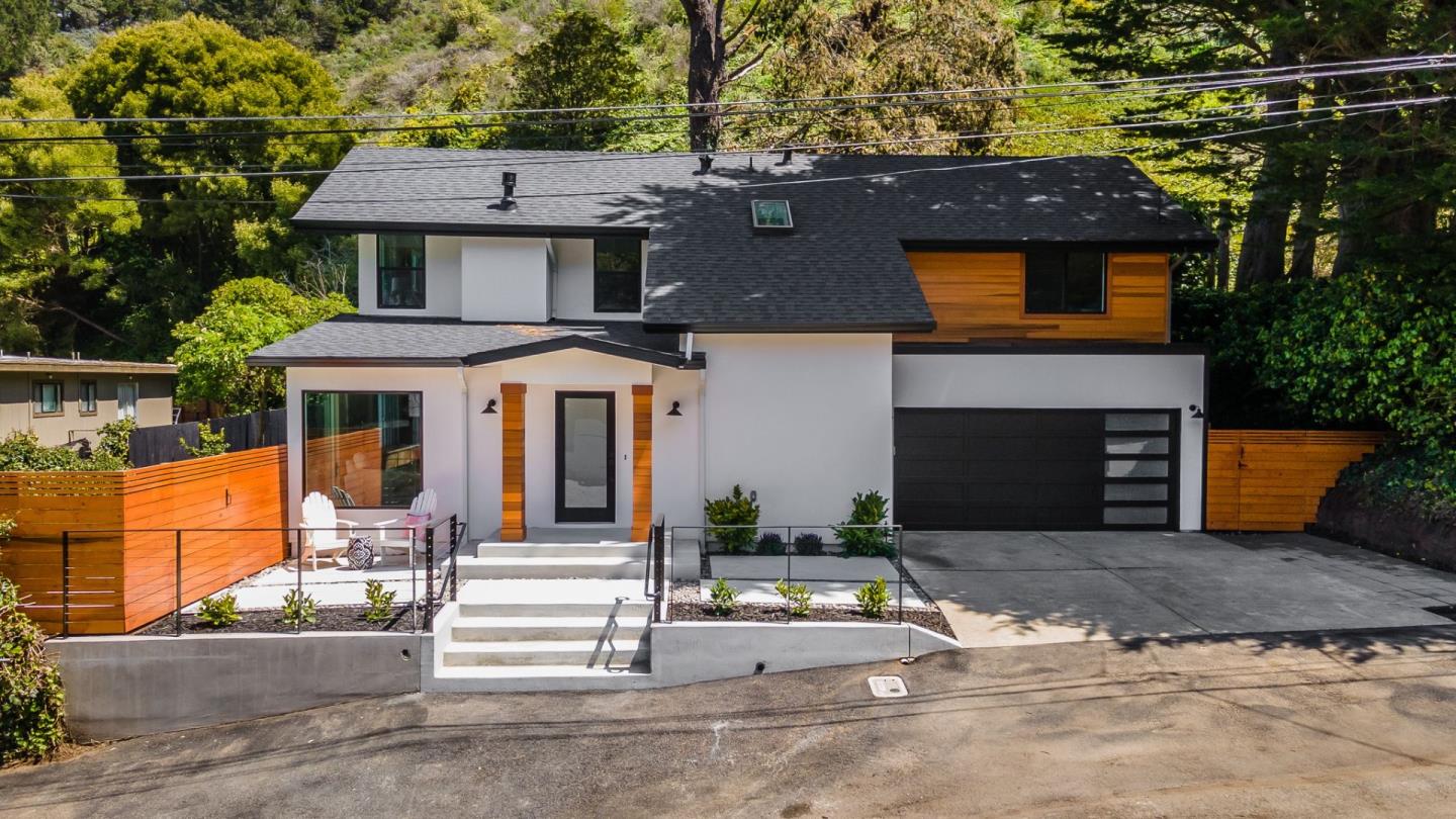 311 Keith Avenue Pacifica, CA 94044 - Photo 34 of 40 a front view of a house with a garden