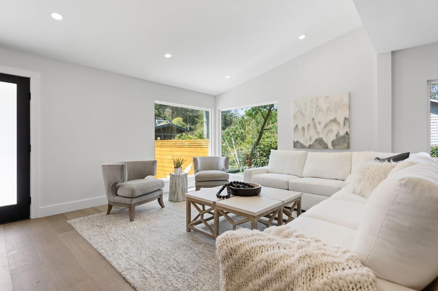 311 Keith Avenue Pacifica, CA 94044 - Photo 7 of 40 a living room with furniture and a large window
