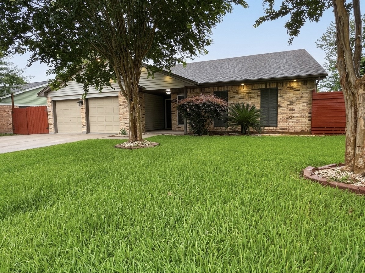 2203 South Houston Road Pasadena, TX 77502 - Photo 2 of 18 Lots of beautiful green space.
