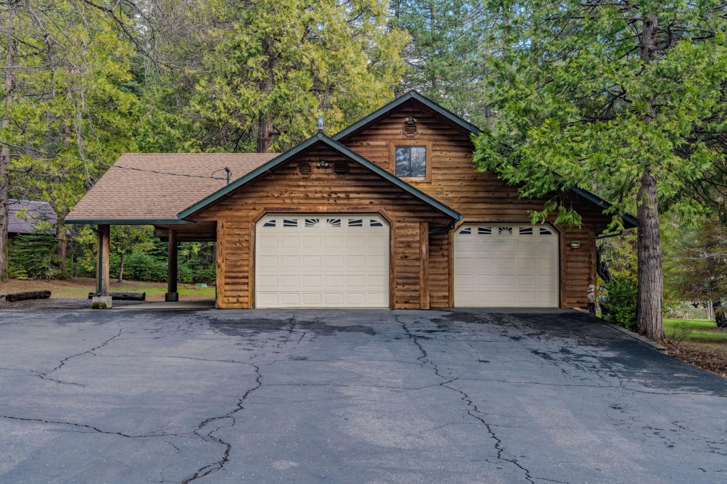 1190 Lily Valley Way West Point, CA 95255 - Photo 3 of 83 Separate 1283 square foot shop with three bays (two front, one rear), quarter bath, storage loft.
