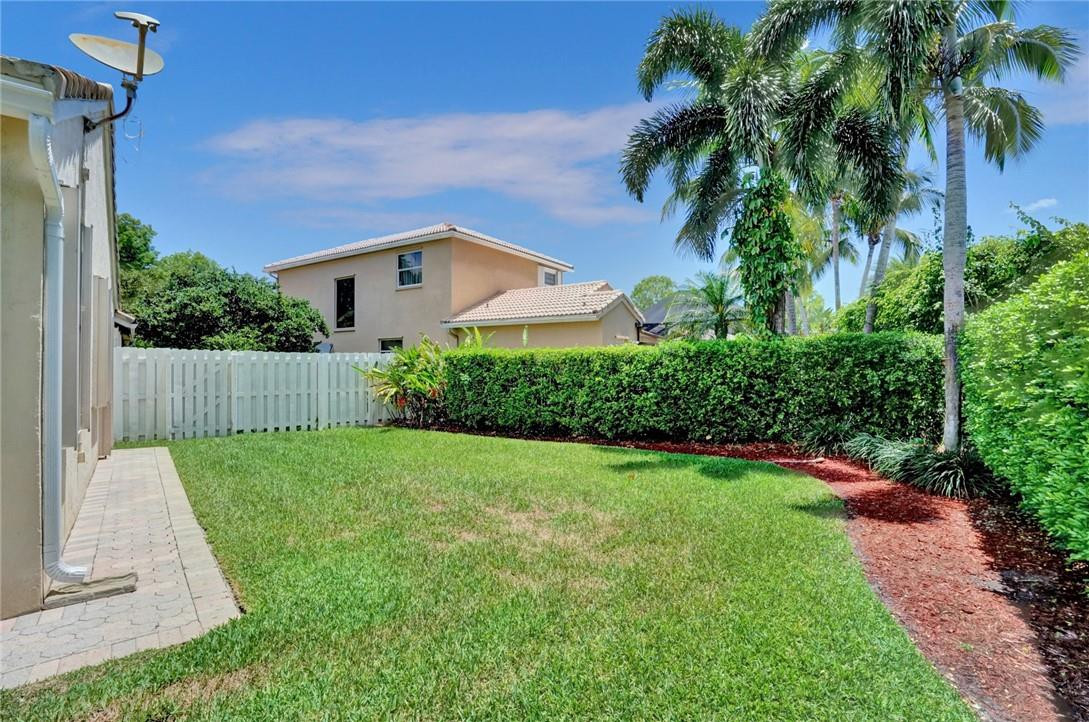 324 Fairmont Road Weston, FL 33326 - Photo 70 of 93 Side yard of the house.