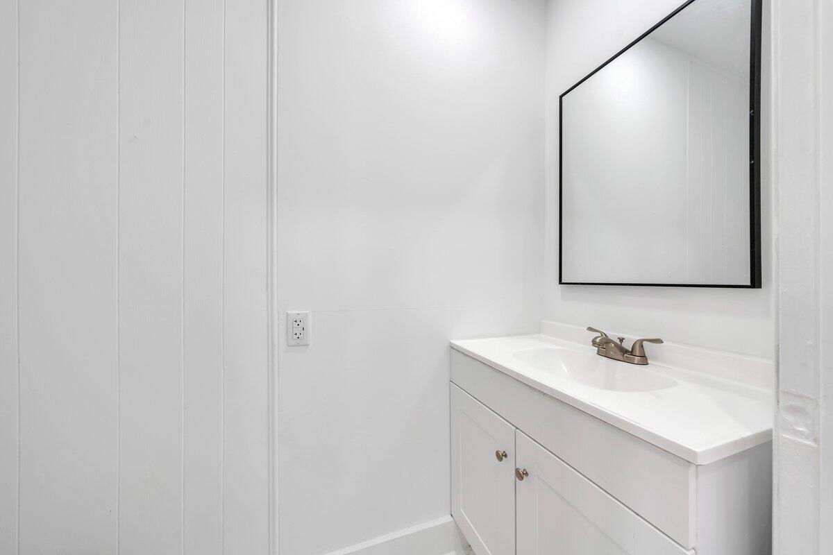 3808 Oldtown Road Shawsville, VA 24162 - Photo 16 of 50 a bathroom with a sink and a mirror