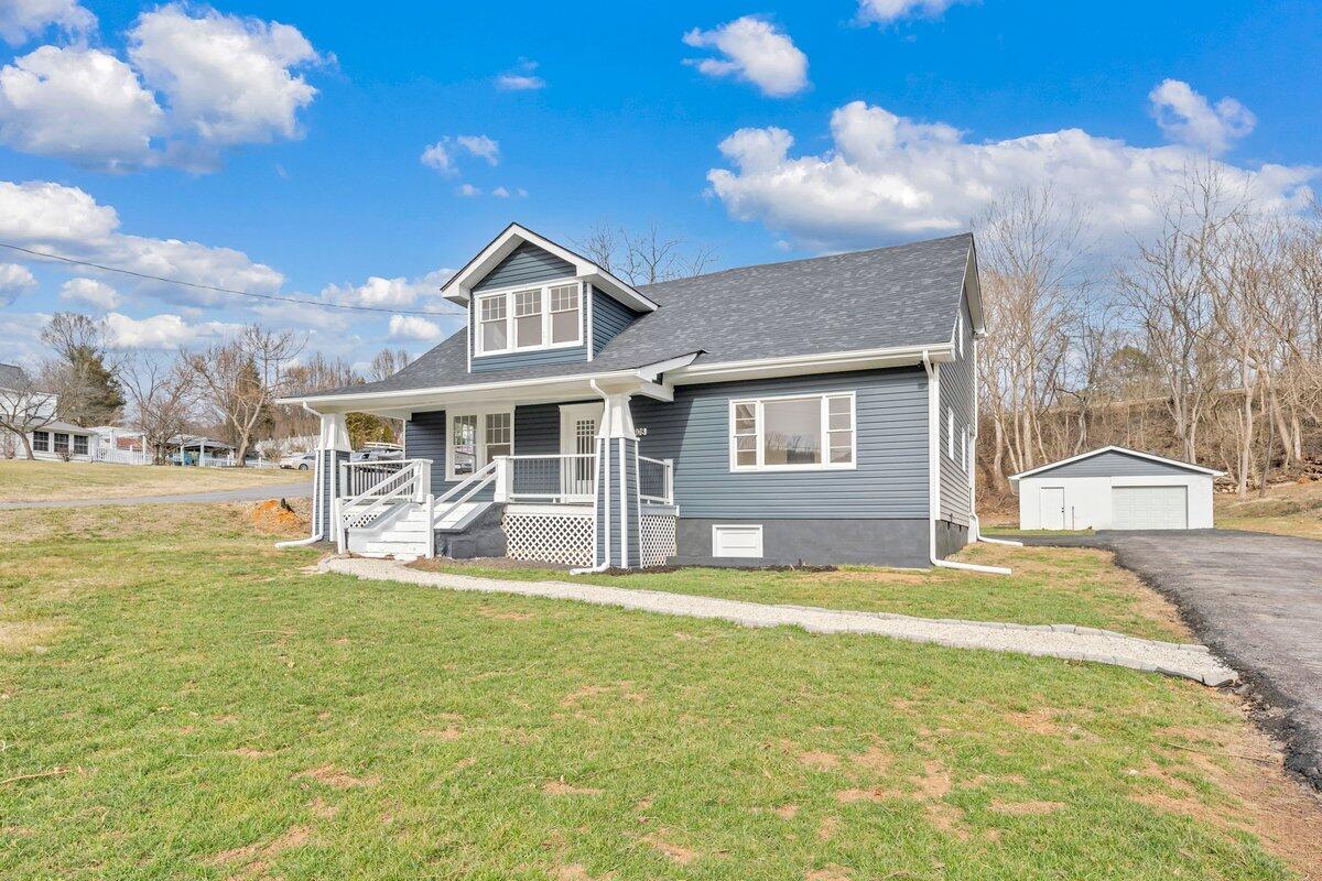 3808 Oldtown Road Shawsville, VA 24162 - Photo 2 of 50 a view of a house with a yard and sitting area