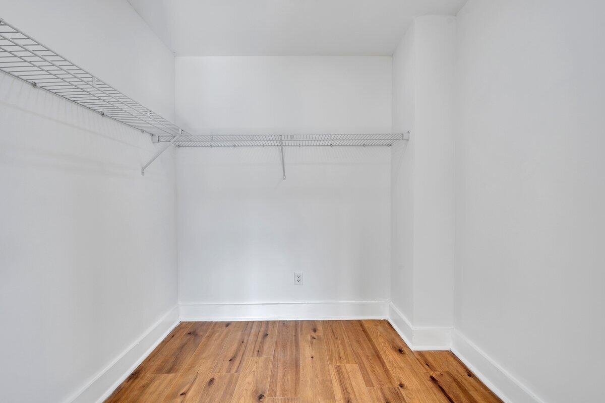 3808 Oldtown Road Shawsville, VA 24162 - Photo 22 of 50 a view of a small space with wooden floor and a window
