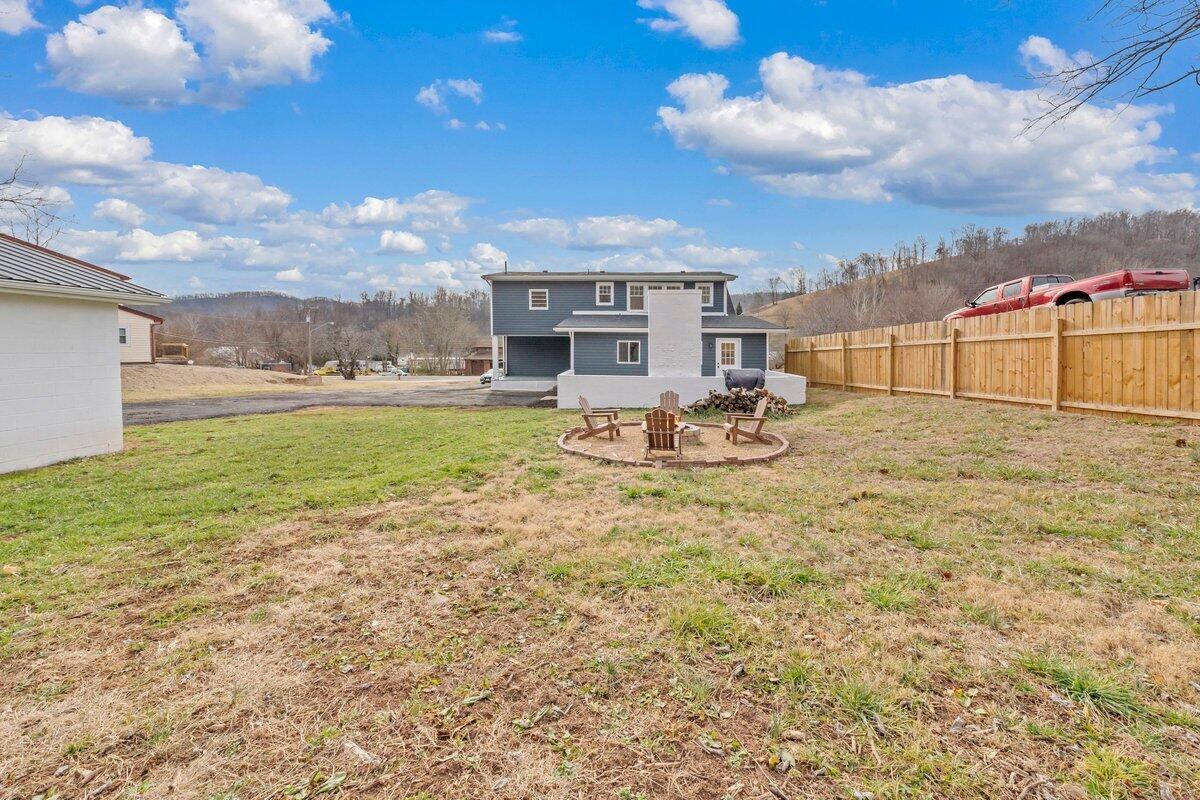 3808 Oldtown Road Shawsville, VA 24162 - Photo 46 of 50 a view of a house with backyard outdoor seating and kitchen
