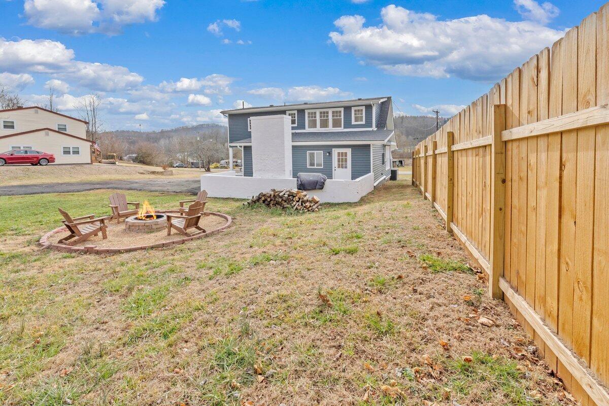 3808 Oldtown Road Shawsville, VA 24162 - Photo 47 of 50 a view of a house with backyard and sitting area