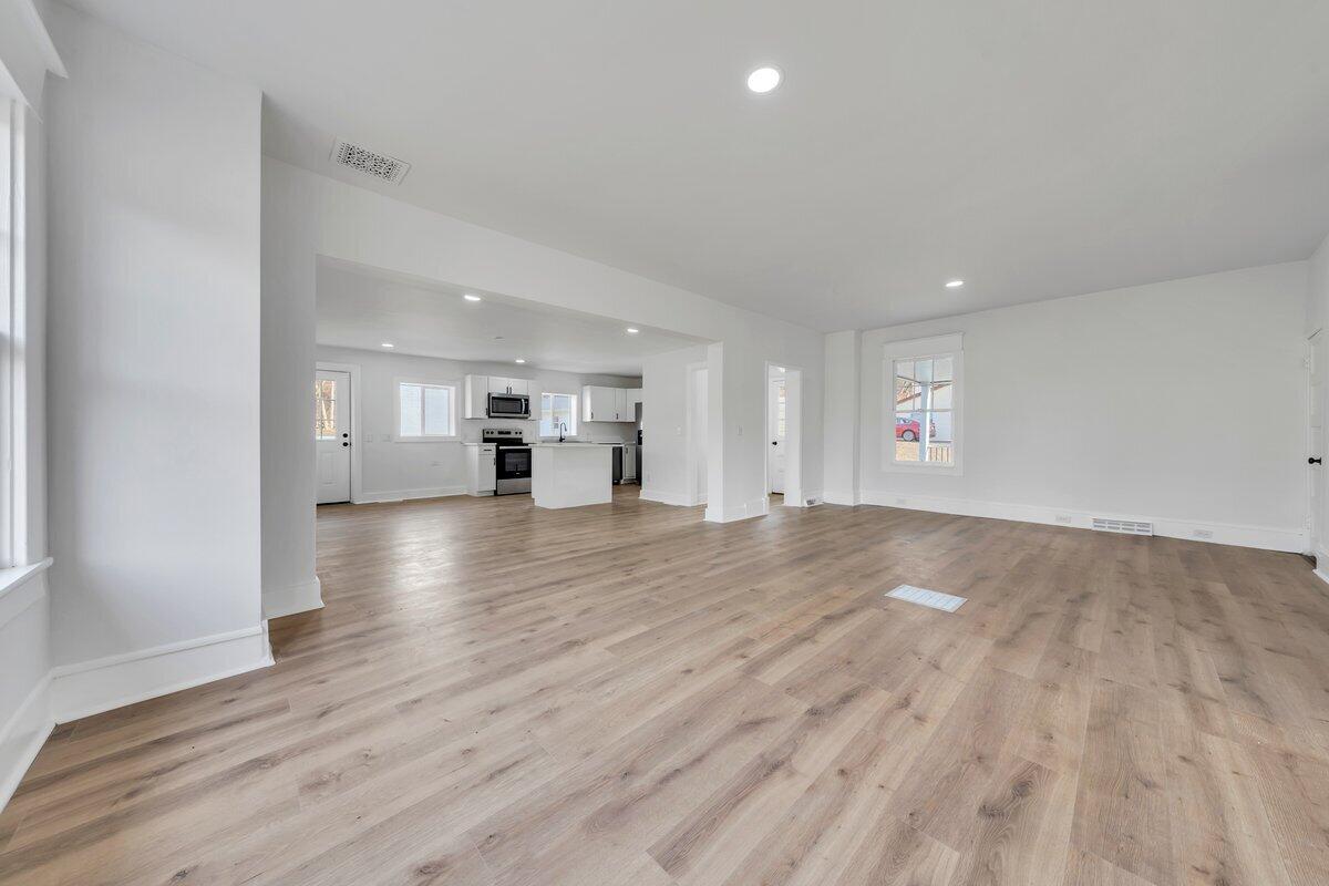3808 Oldtown Road Shawsville, VA 24162 - Photo 6 of 50 a view of empty room with wooden floor