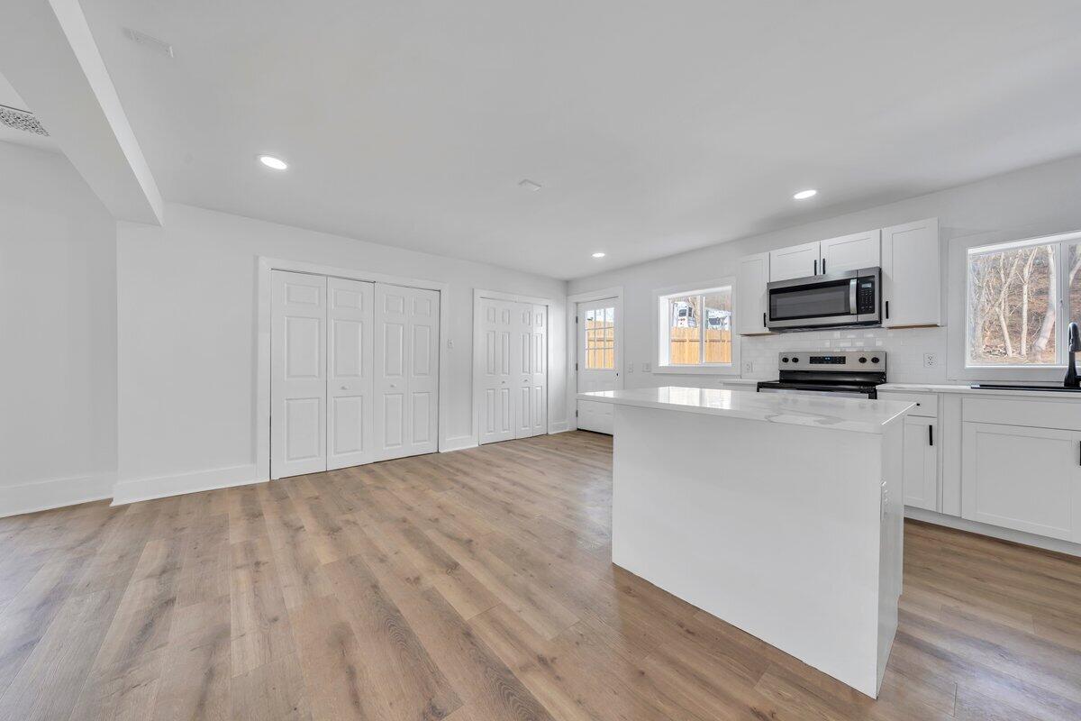 3808 Oldtown Road Shawsville, VA 24162 - Photo 10 of 50 a view of a kitchen with microwave and cabinets