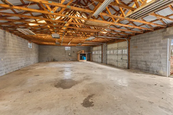 a view of a room with wooden walls