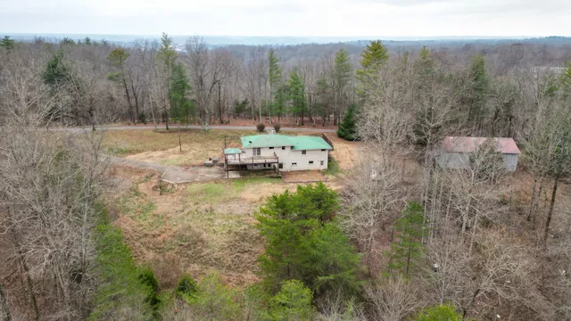 a view of a backyard of the house