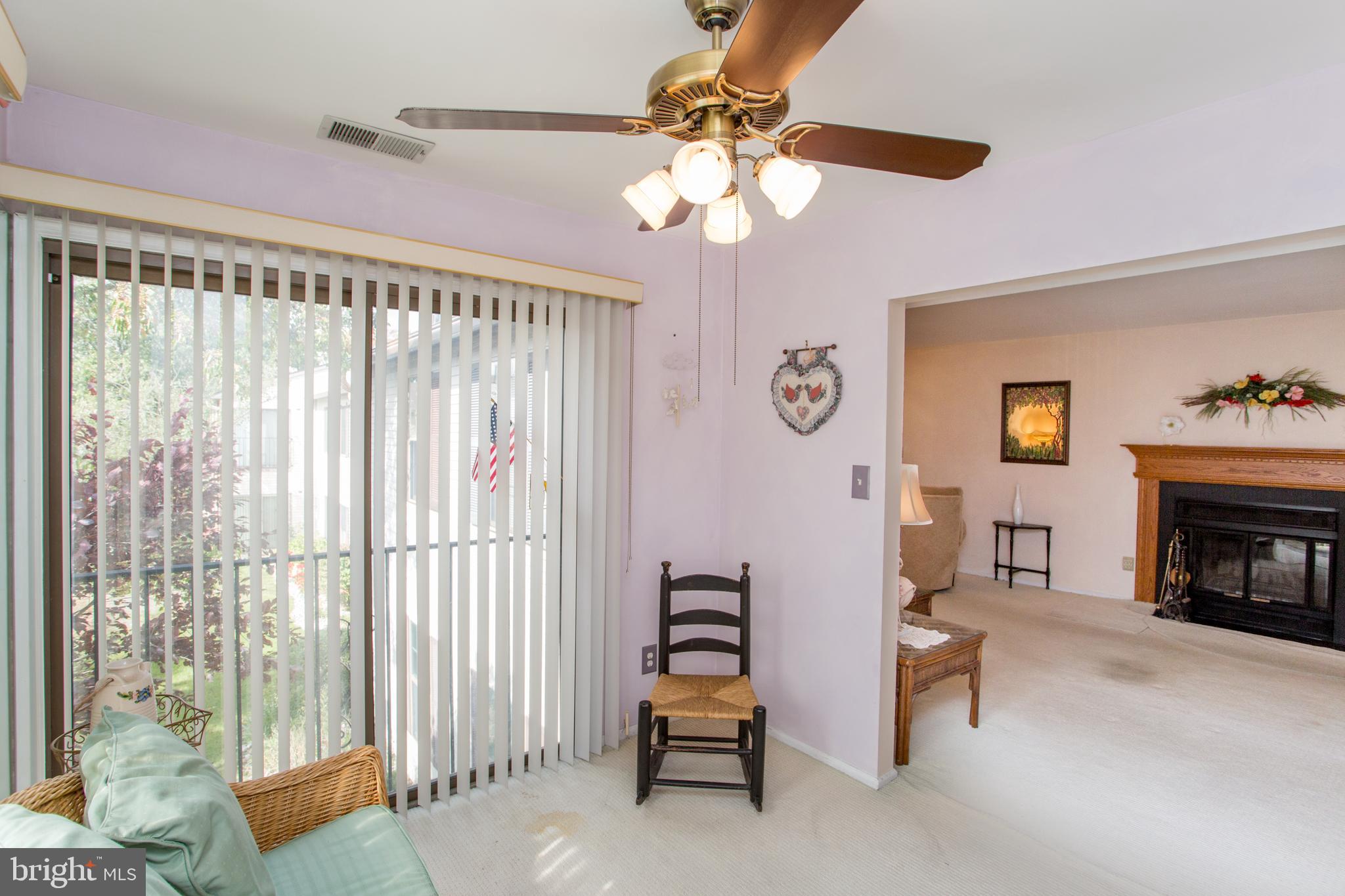 60 B Sumac Court Mount Laurel, NJ 08054 - Photo 11 of 42 a living room with furniture and a fireplace