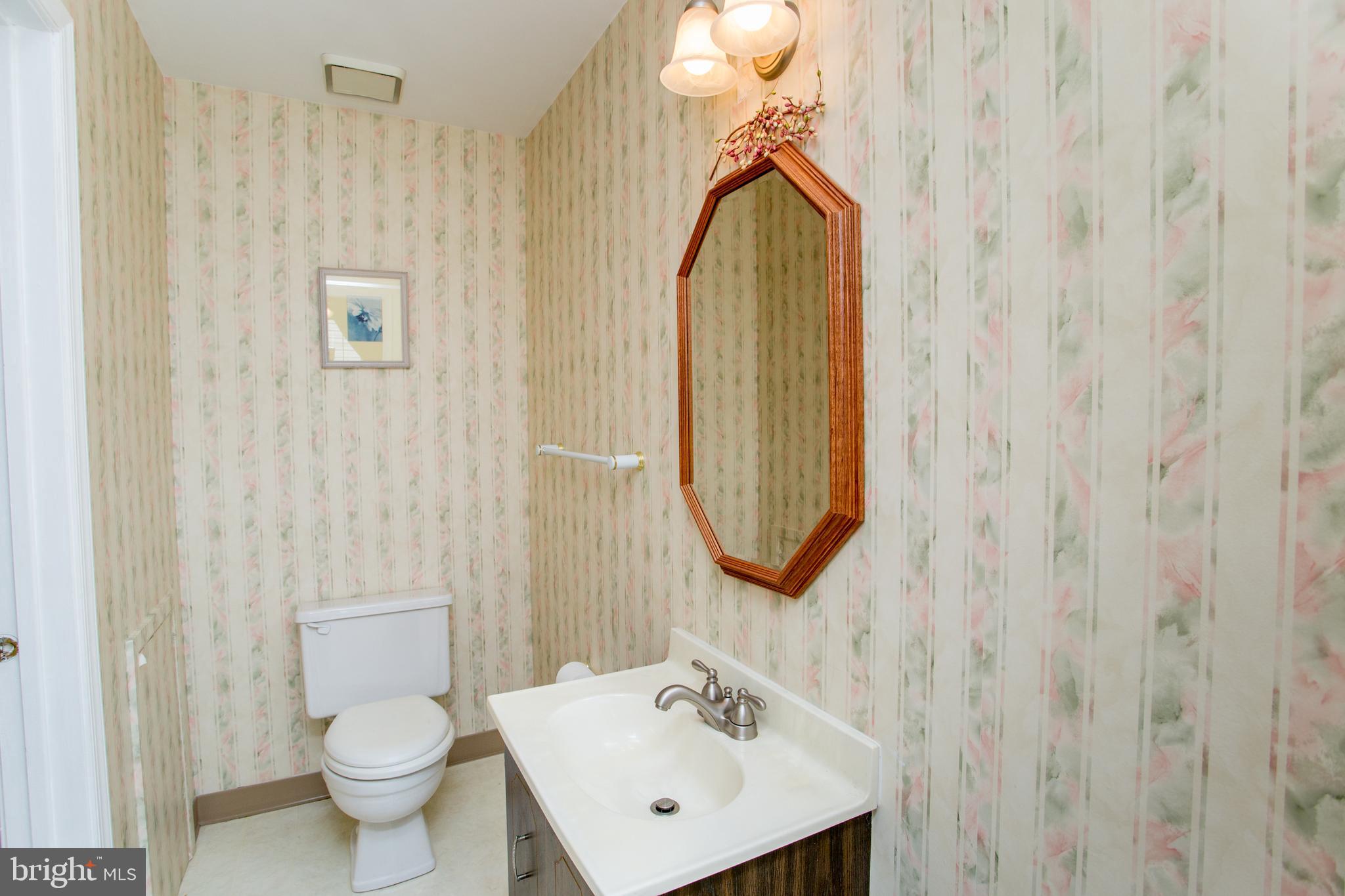 60 B Sumac Court Mount Laurel, NJ 08054 - Photo 25 of 42 a bathroom with a sink a toilet and mirror