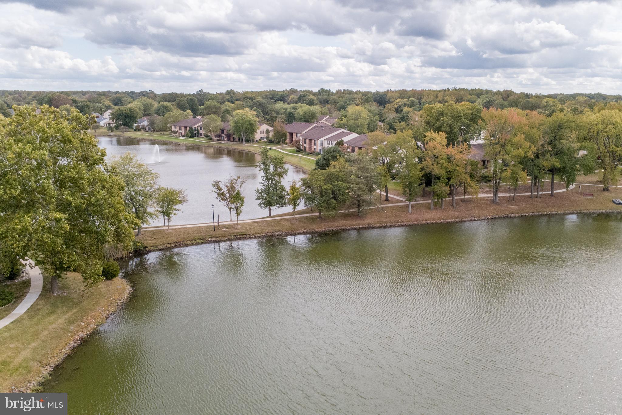 60 B Sumac Court Mount Laurel, NJ 08054 - Photo 37 of 42 a view of a lake with a city