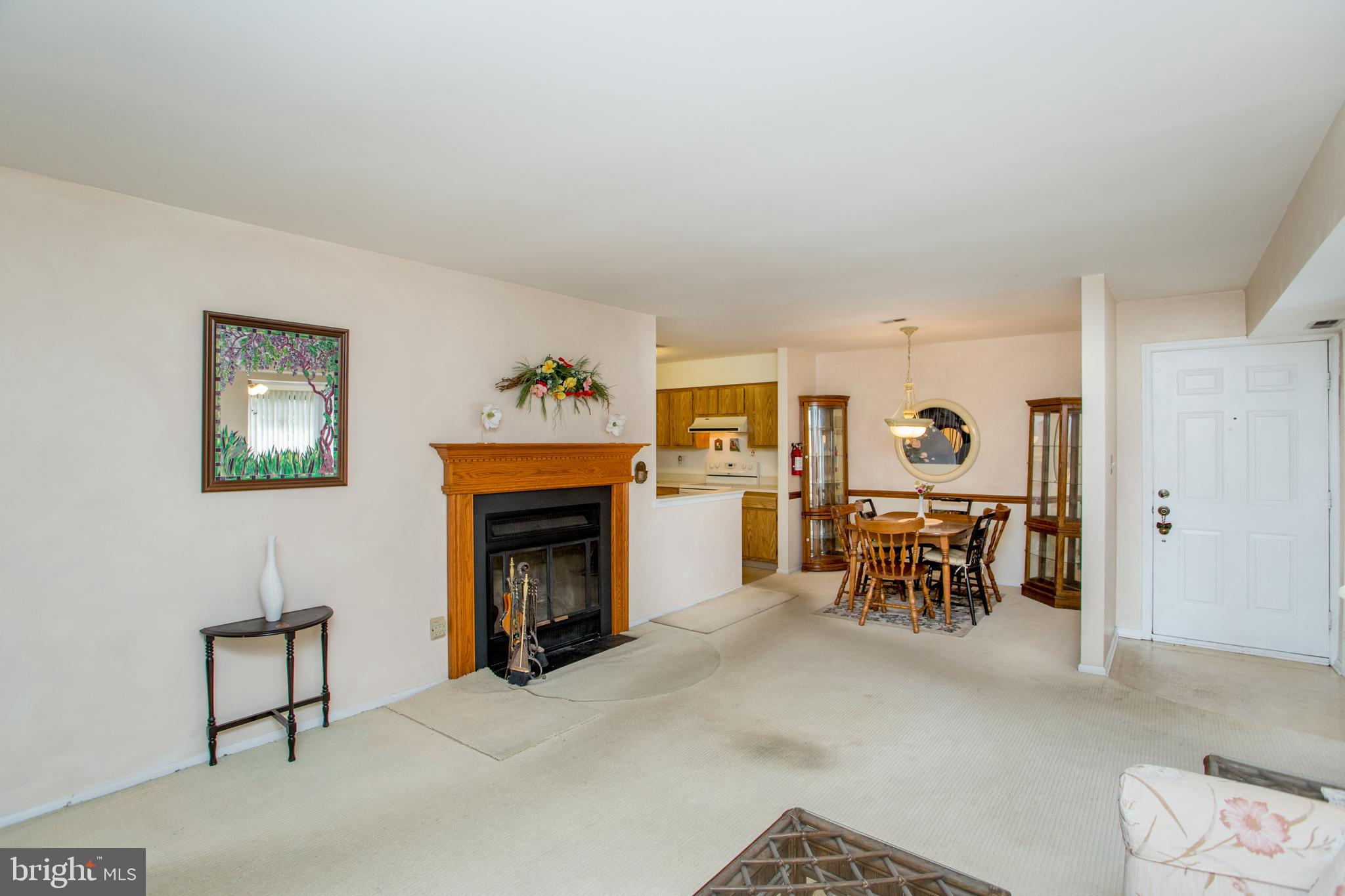60 B Sumac Court Mount Laurel, NJ 08054 - Photo 7 of 42 a view of a livingroom with furniture and a fireplace