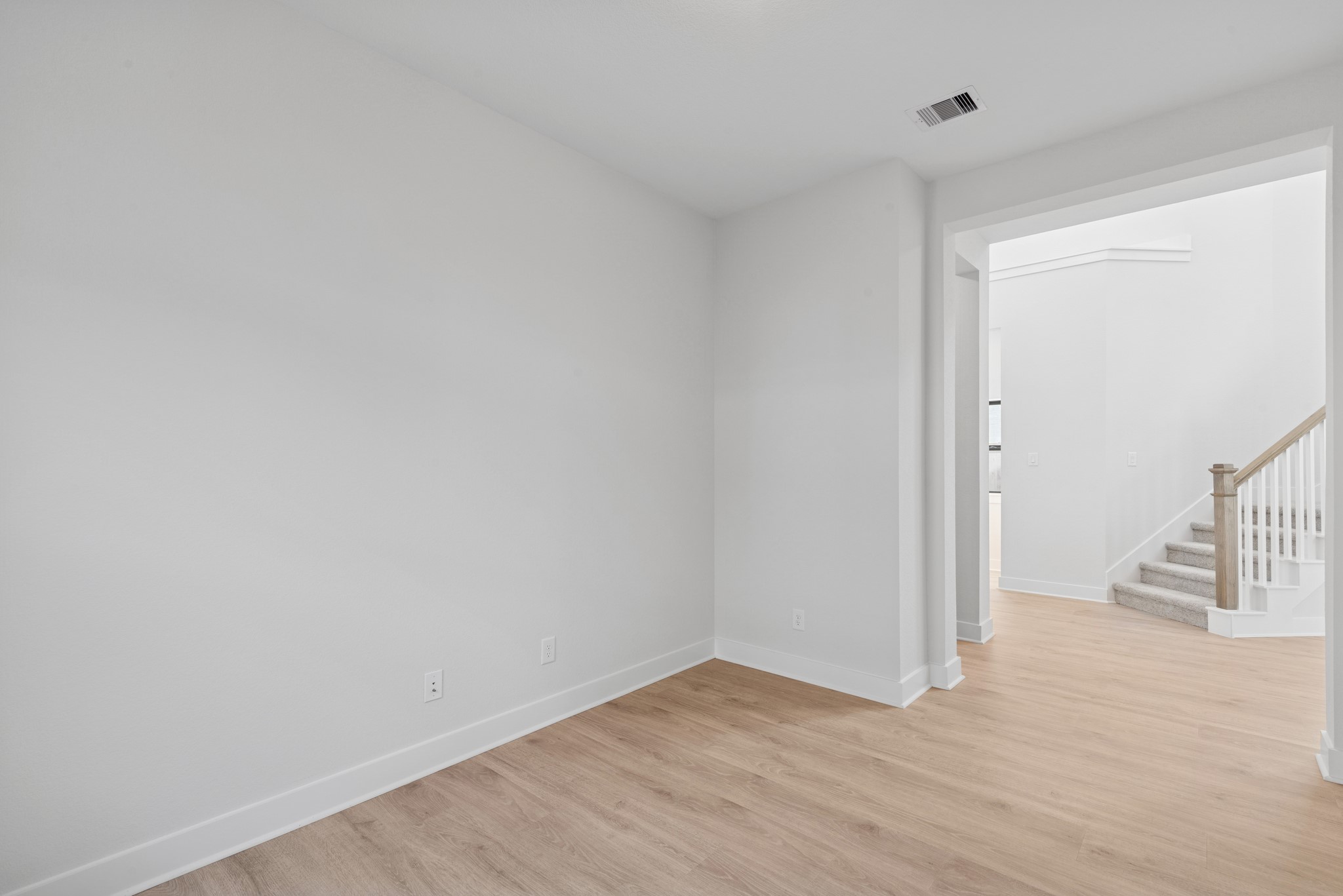 8751 Mancos Valley Porter, TX 77365 - Photo 15 of 48 a view of an empty room with wooden floor