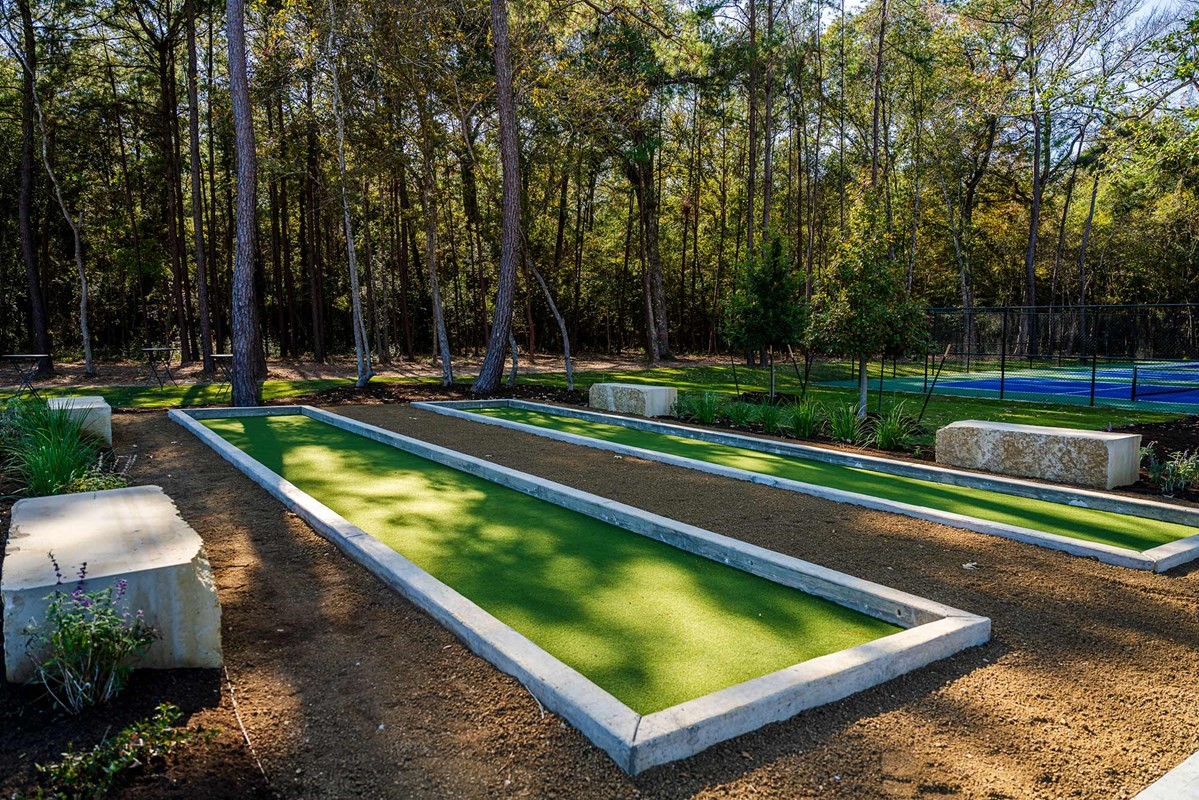 8751 Mancos Valley Porter, TX 77365 - Photo 44 of 48 a view of swimming pool with seating area and trees in the background