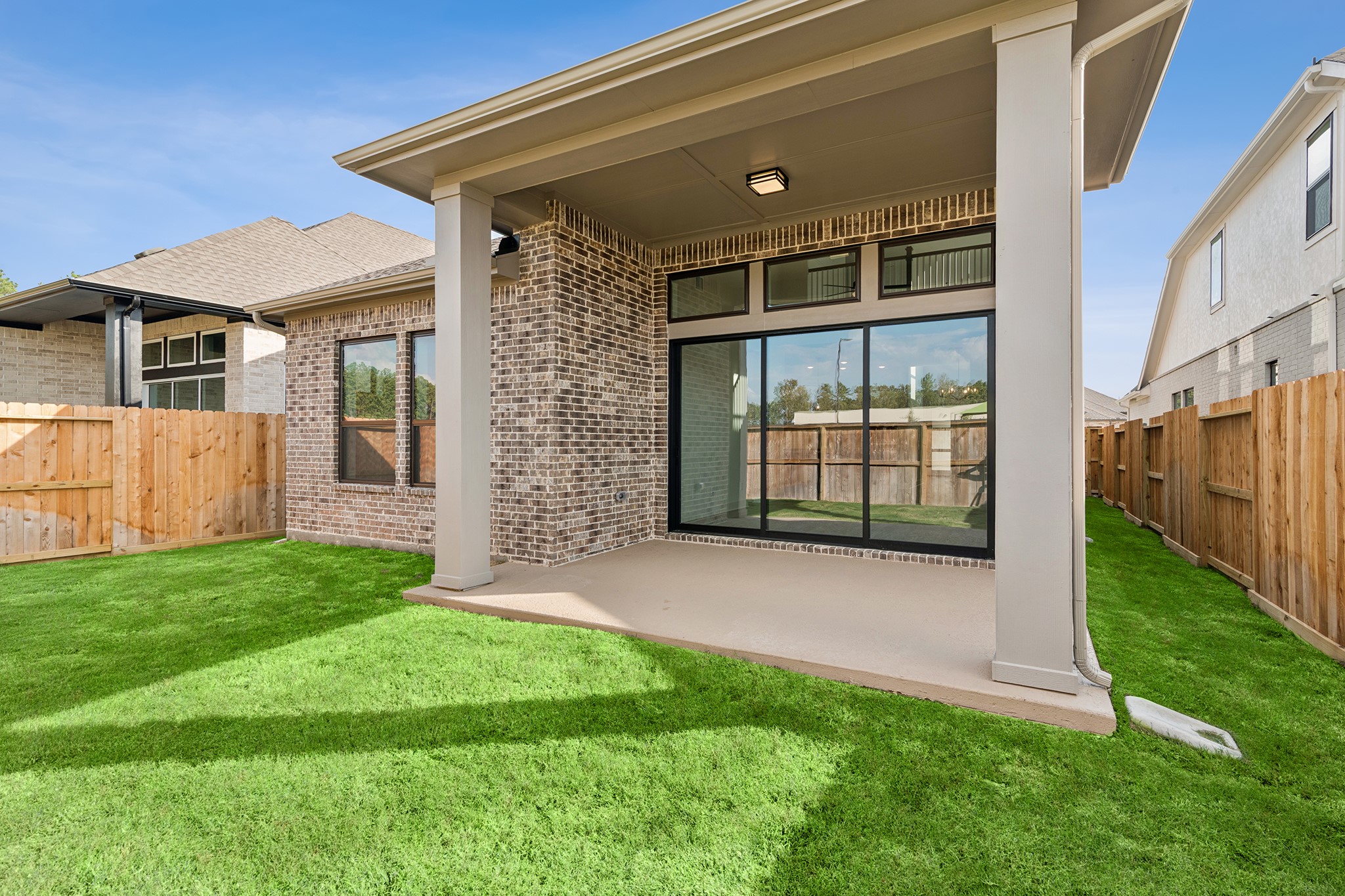 8751 Mancos Valley Porter, TX 77365 - Photo 8 of 48 a view of a back yard of the house