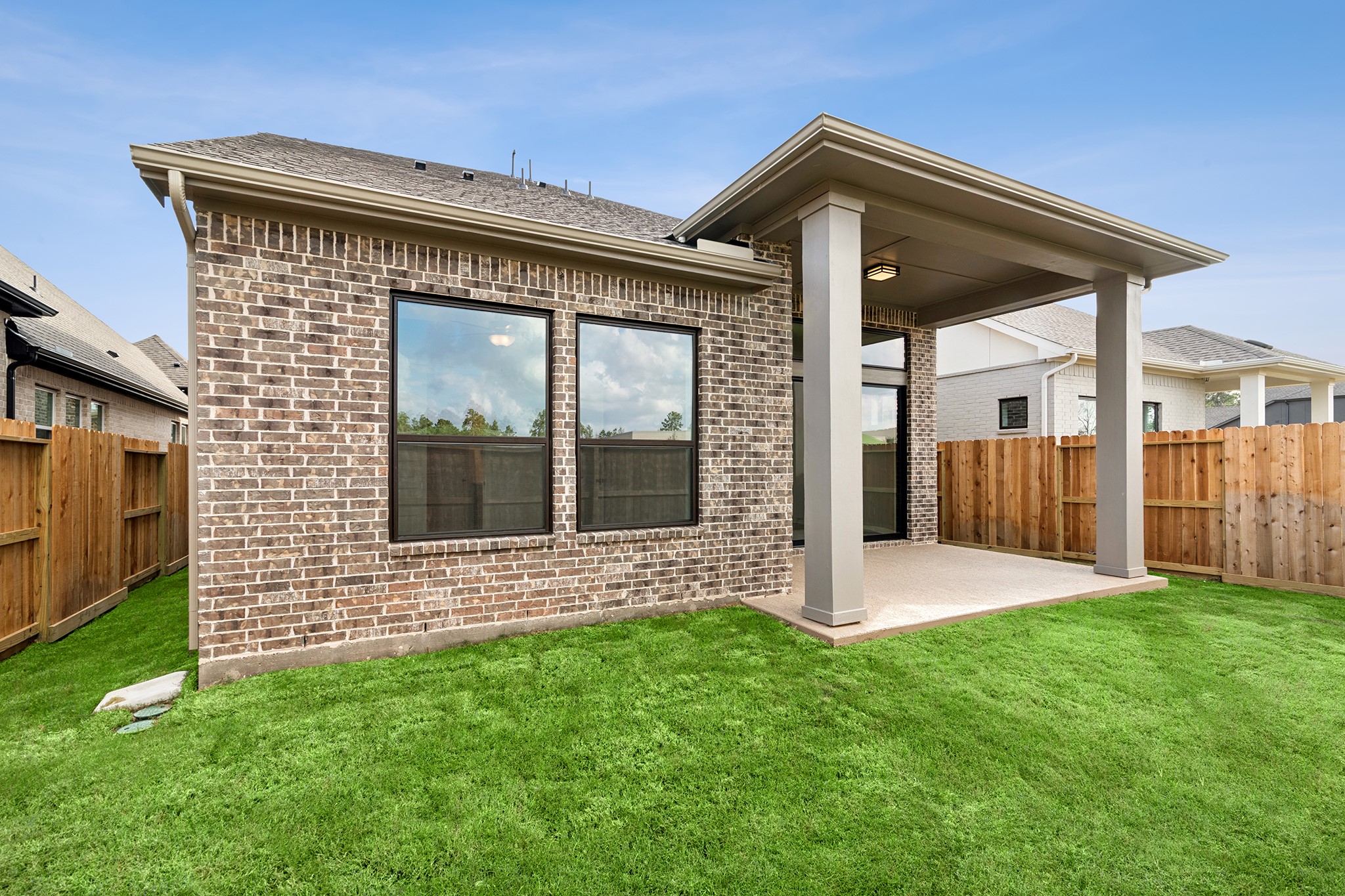 8751 Mancos Valley Porter, TX 77365 - Photo 9 of 48 a front view of a house with a yard