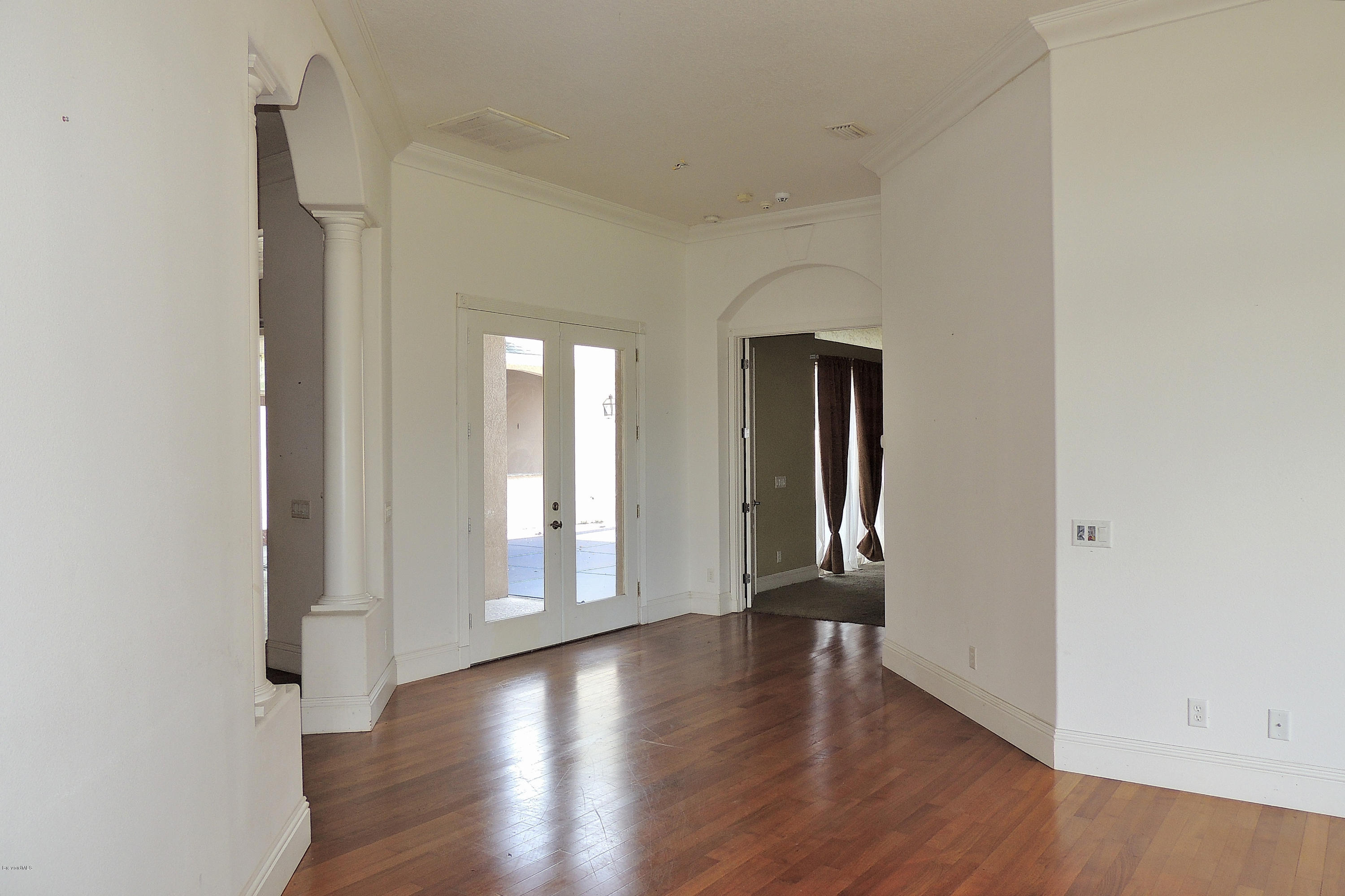 1120 Riviera Drive Northeast Palm Bay, FL 32905 - Photo 18 of 44 a view of an entryway with wooden floor