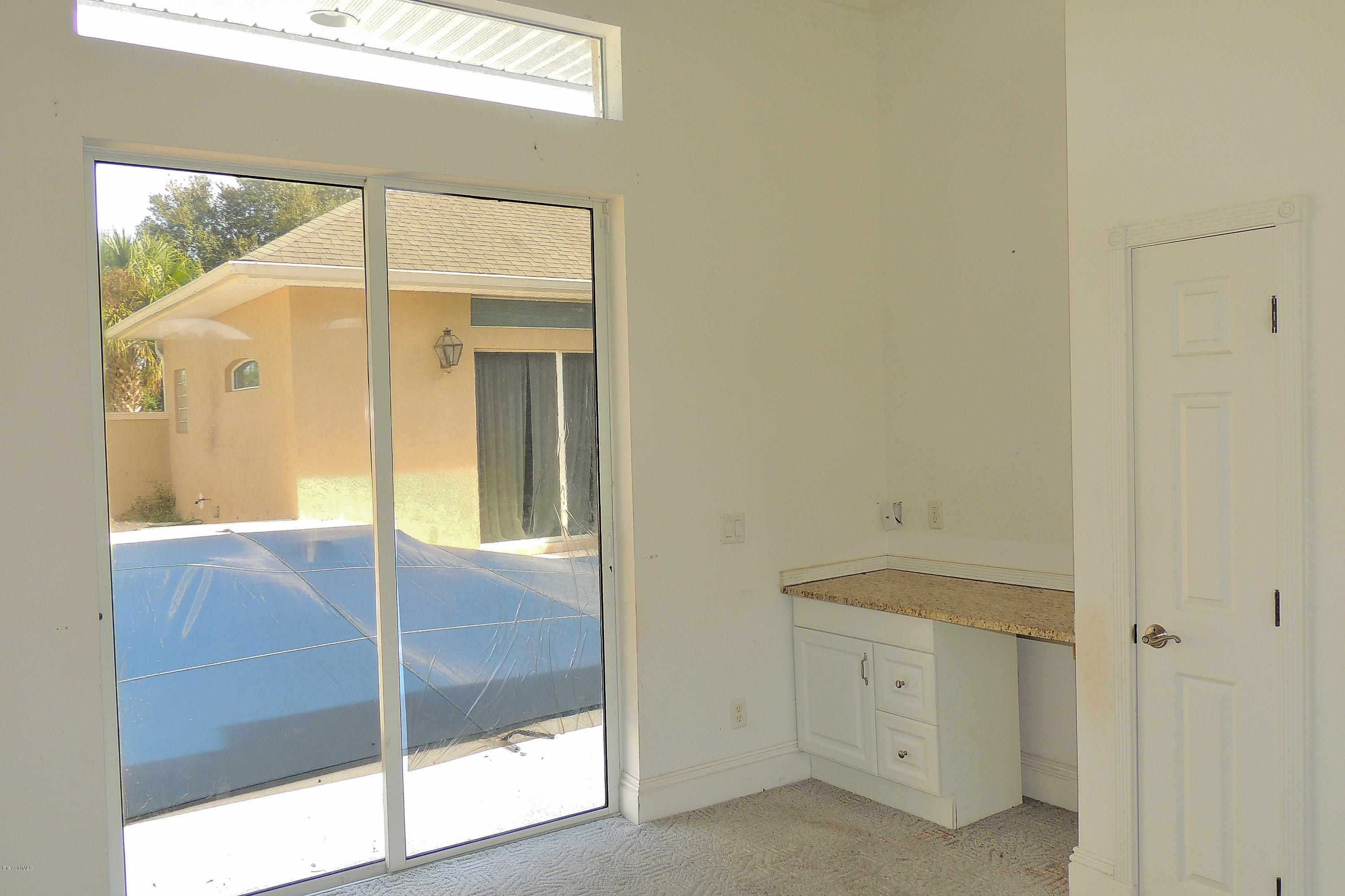 1120 Riviera Drive Northeast Palm Bay, FL 32905 - Photo 31 of 44 a view of an entryway