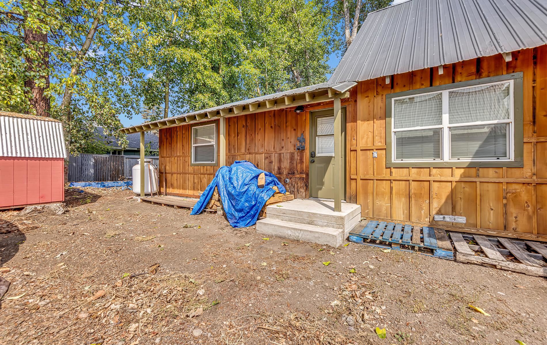 167 Stover Road Chester, CA 96020 - Photo 33 of 33 a view of a house with a backyard and sitting area