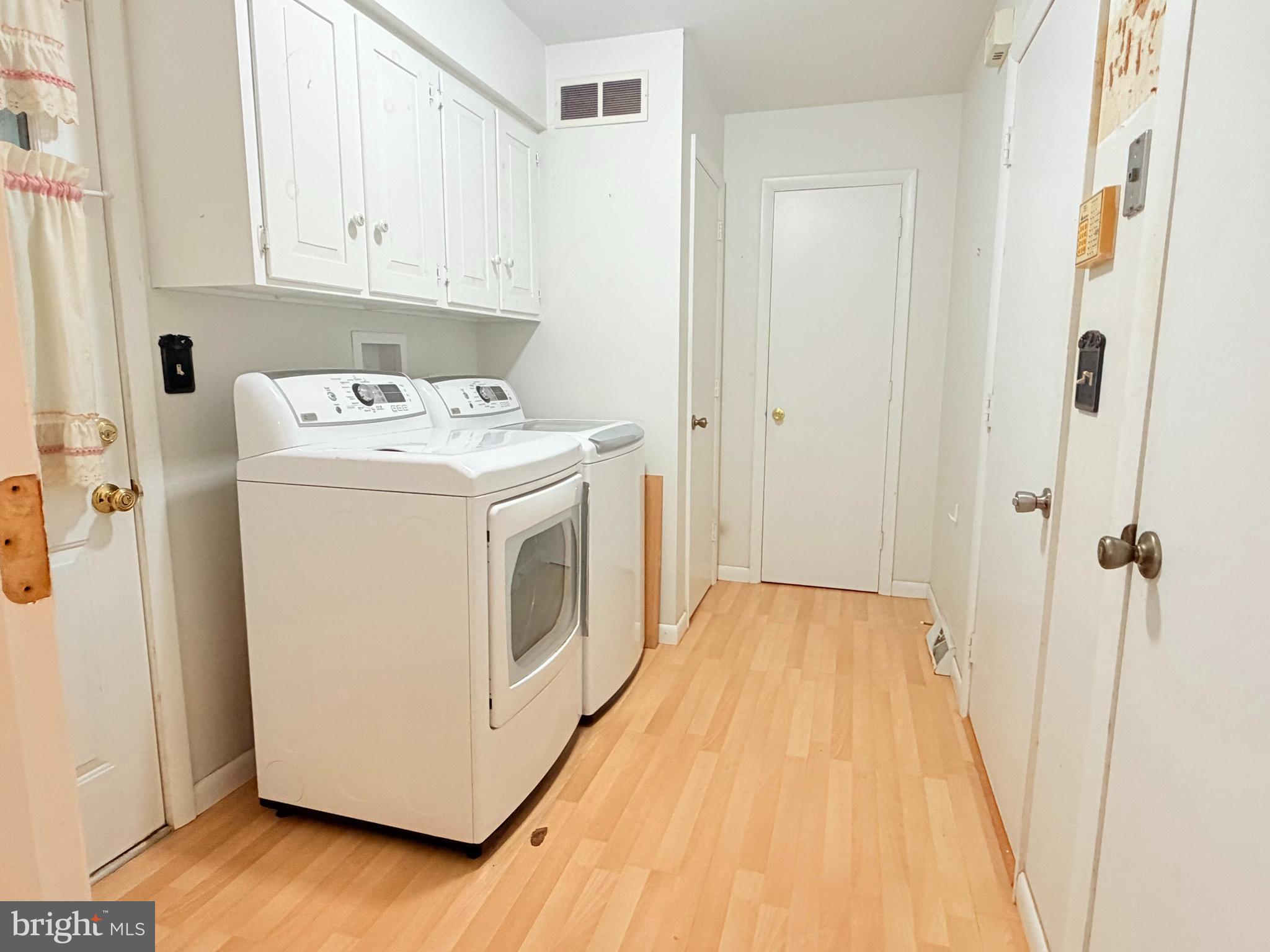 694 Hickory Ridge Road Smyrna, DE 19977 - Photo 14 of 23 a view of utility room with washer and dryer