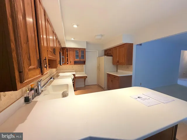 a large bedroom with a large bed and a large closet