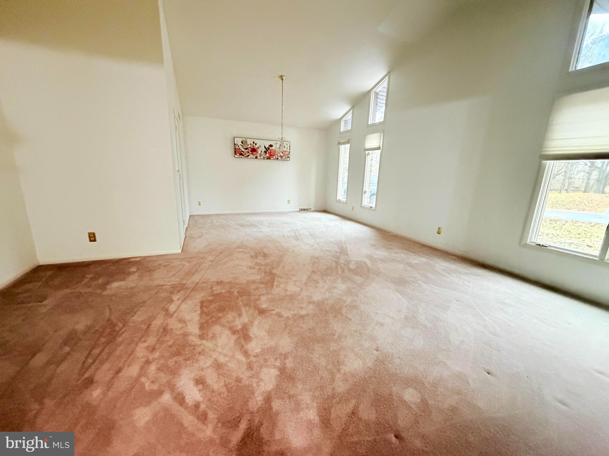 694 Hickory Ridge Road Smyrna, DE 19977 - Photo 9 of 23 a view of an empty room with a window