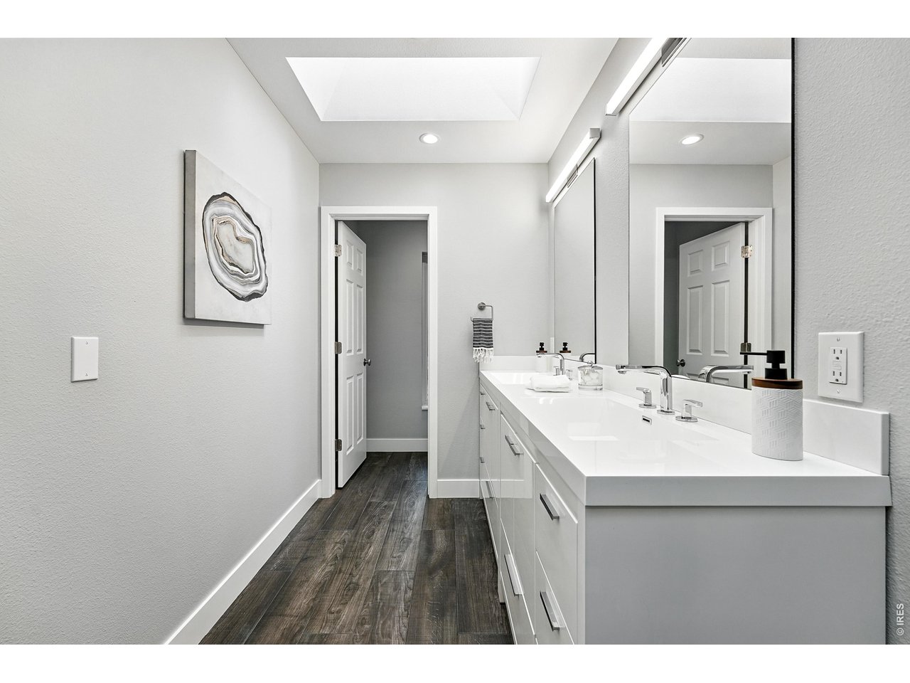 4557 Apple Way Boulder, CO 80301 - Photo 28 of 42 The primary bath creates a calming escape with refined finishes and a layout designed for comfort and ease.