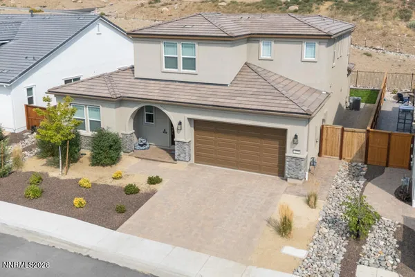 a front view of a house with yard