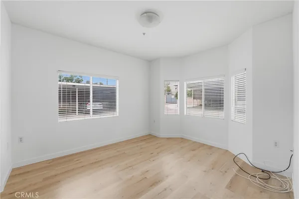 a view of a room with windows