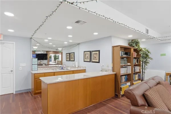 a view of a livingroom with furniture and furniture