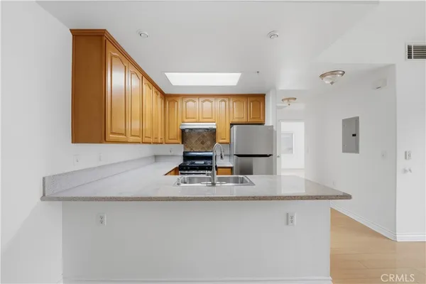 a living room with furniture and window
