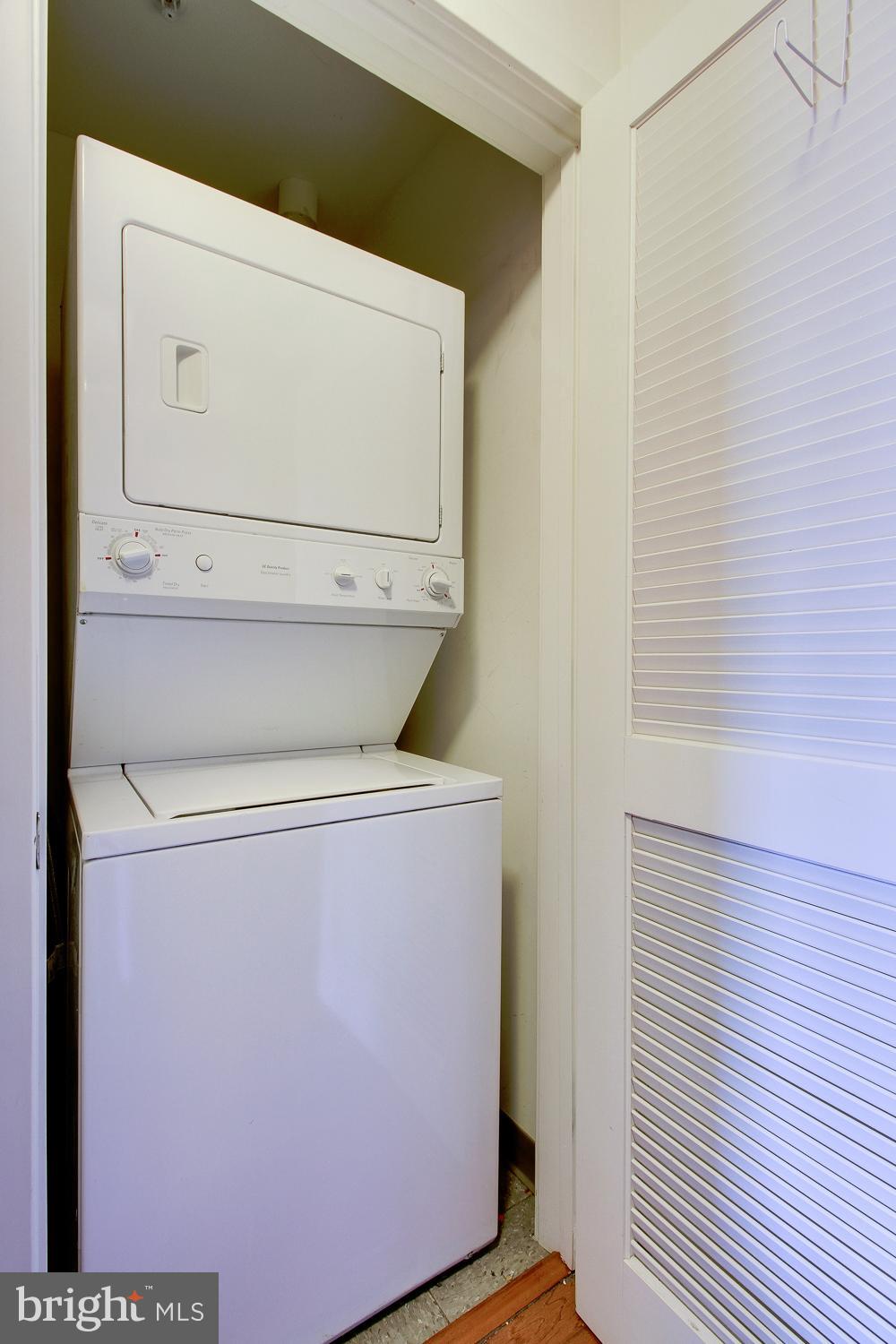 1001 L Street Northwest, Unit 908 Washington, DC 20001 - Photo 13 of 23 Stacked Washer/Dryer in unit