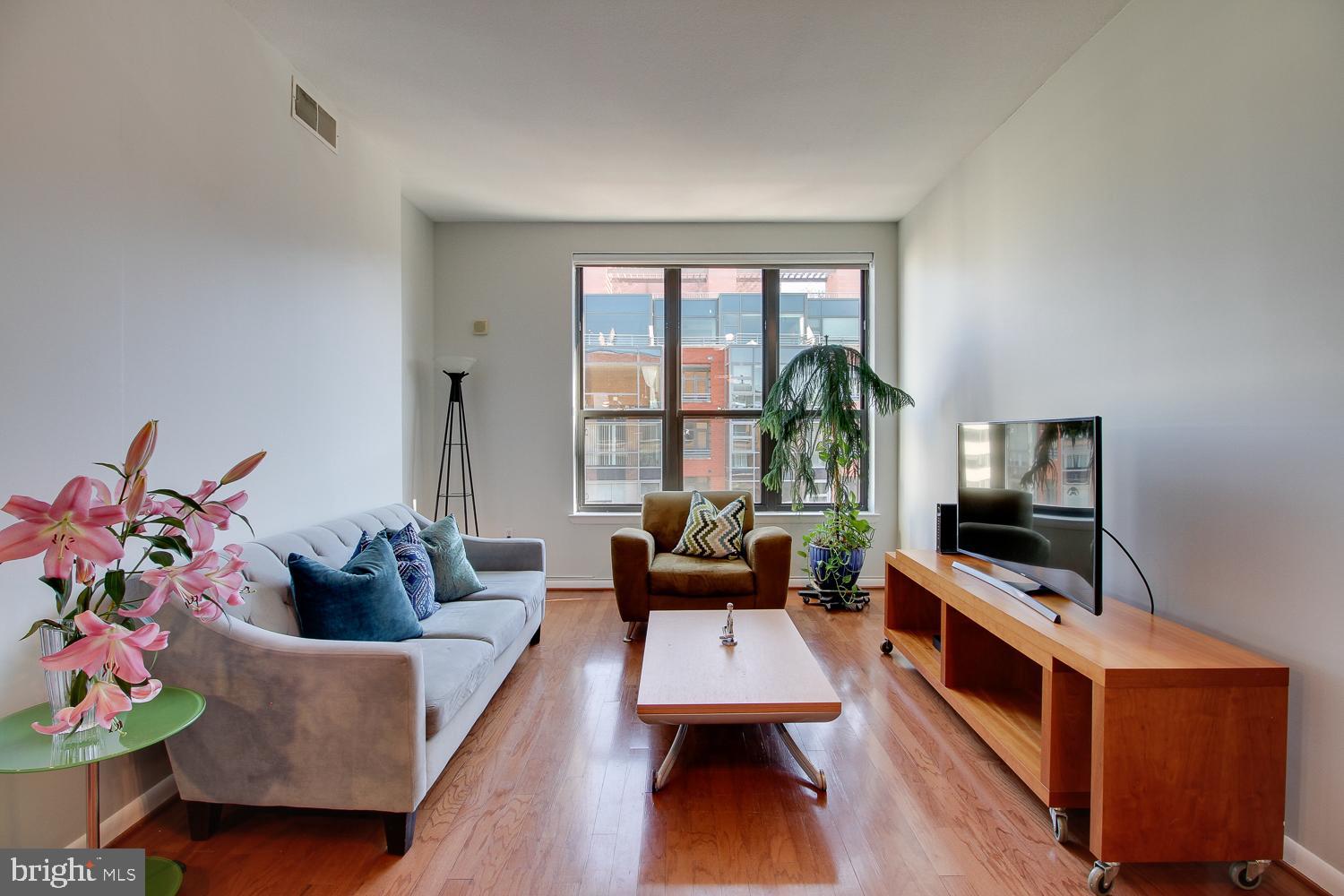 1001 L Street Northwest, Unit 908 Washington, DC 20001 - Photo 8 of 23 Brightly lit living room