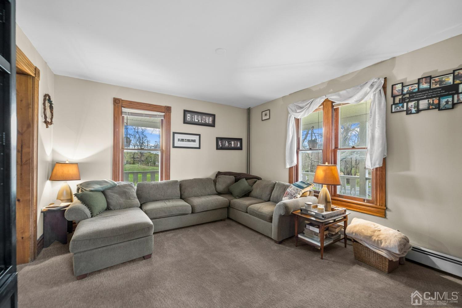 35 Tennent Road Morganville, NJ 07751 - Photo 8 of 57 a living room with furniture and a window