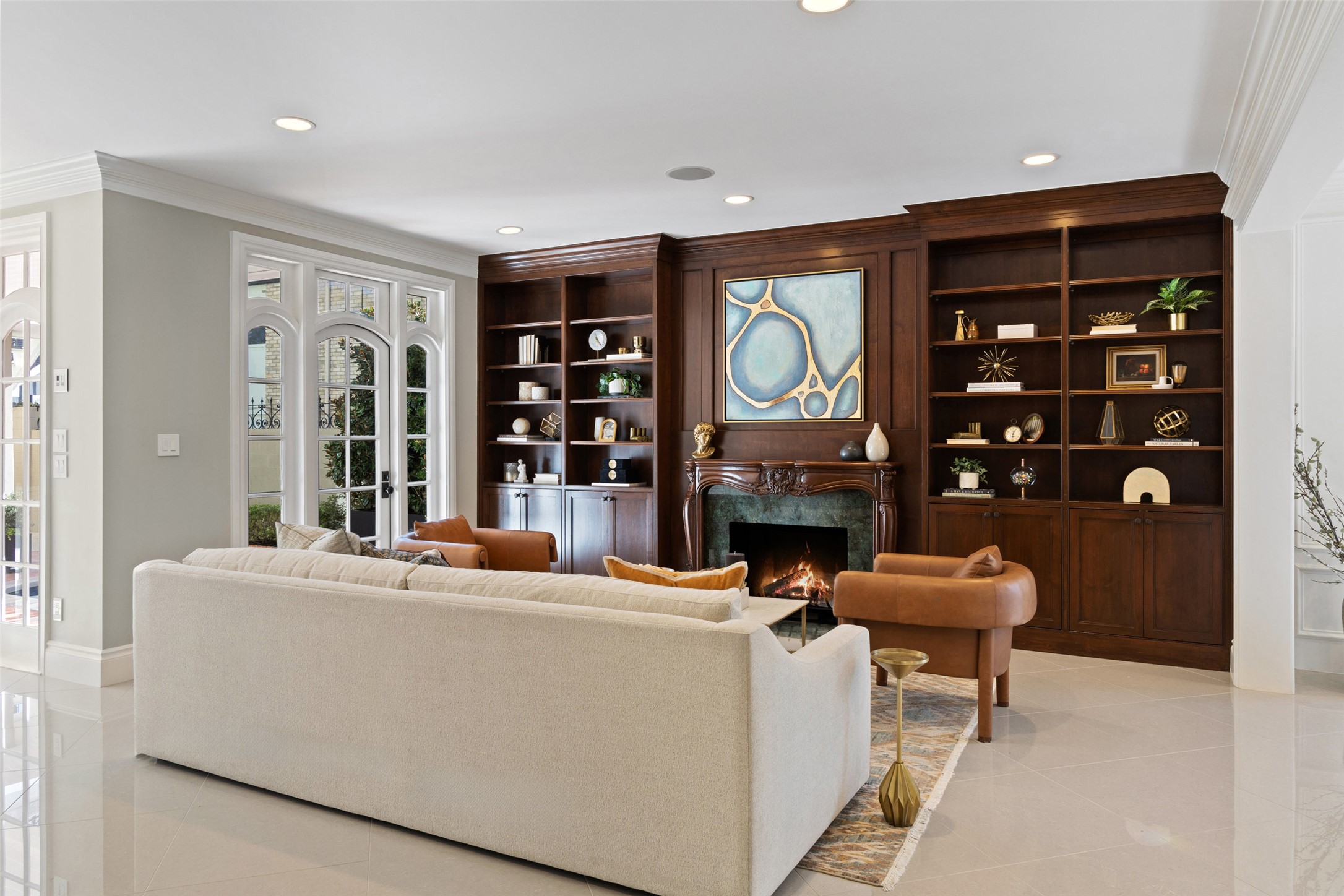 1810 West 35th Street Austin, TX 78703 - Photo 11 of 40 Wrapped in French wood paneling and Labradorite mineral rock fireplace, this distinguished living area is a masterpiece.