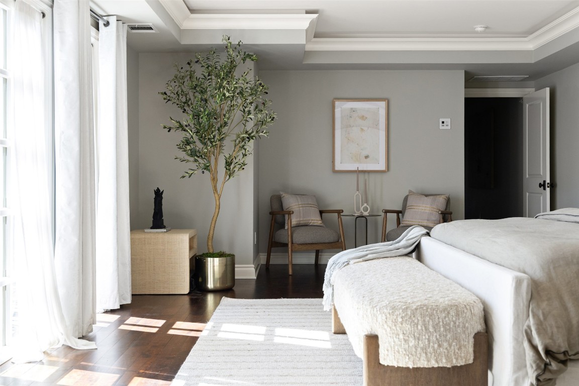 1810 West 35th Street Austin, TX 78703 - Photo 17 of 40 a bedroom with a bed and a potted plant