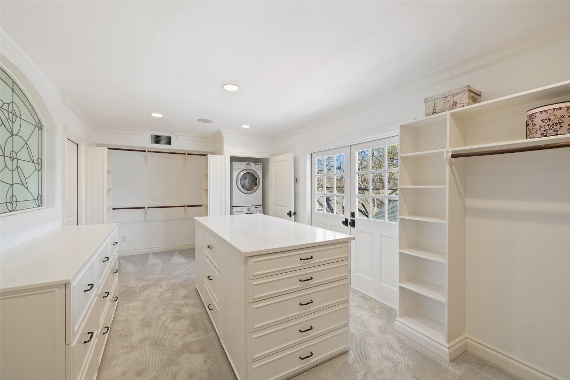 1810 West 35th Street Austin, TX 78703 - Photo 22 of 40 a view of kitchen with white cabinets and refrigerator