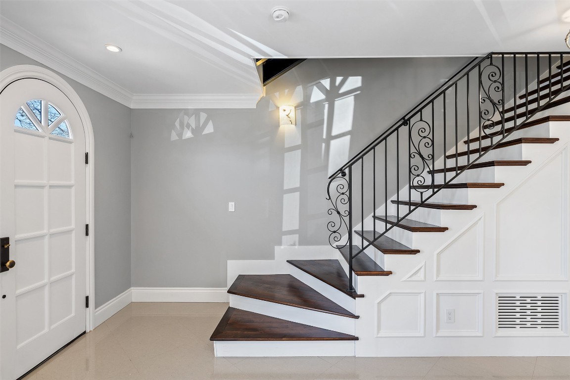 1810 West 35th Street Austin, TX 78703 - Photo 3 of 40 From the moment you pass through its grand entry, you are enveloped in a world of classic elegance.