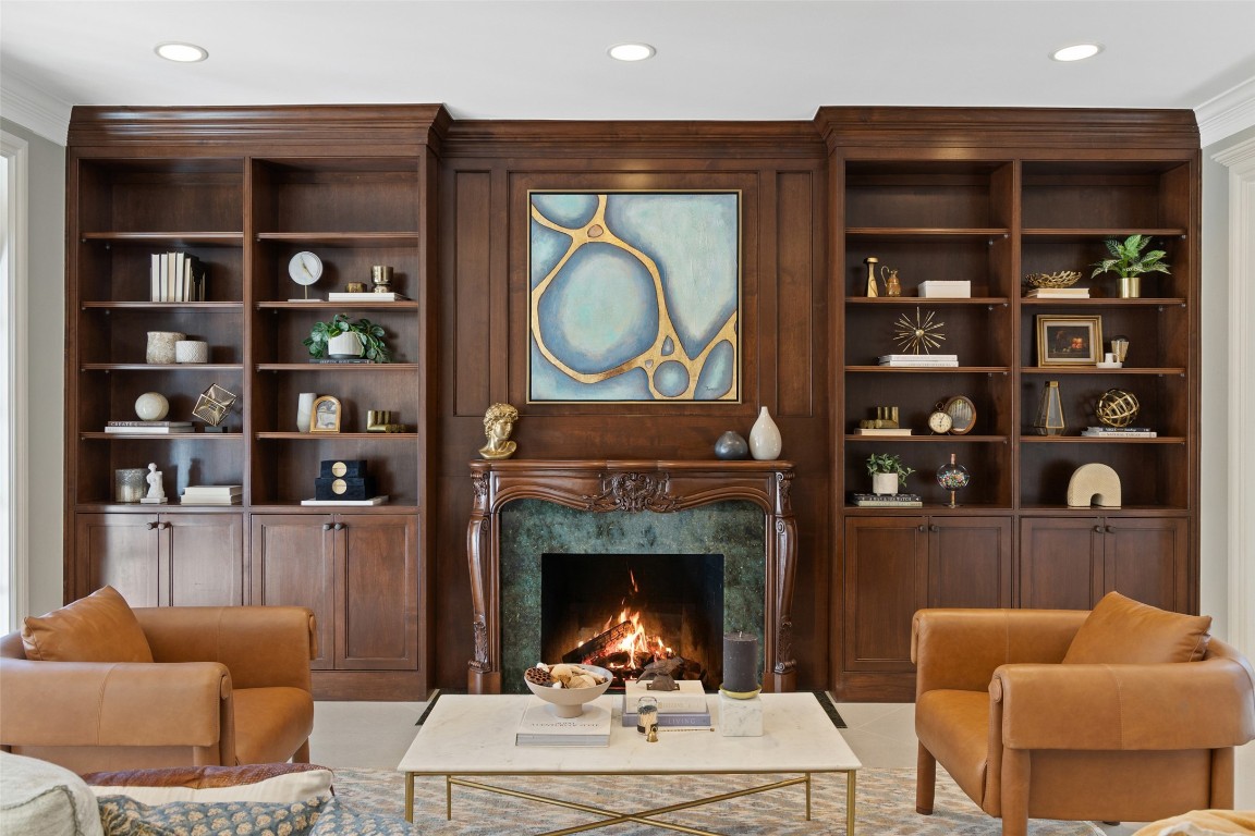 1810 West 35th Street Austin, TX 78703 - Photo 8 of 40 Wrapped in French wood paneling and Labradorite mineral rock fireplace, this distinguished living area is a masterpiece.