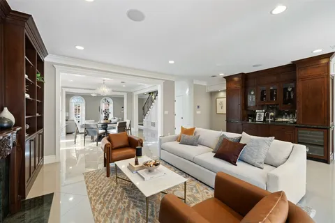 a bedroom with a bed and a potted plant