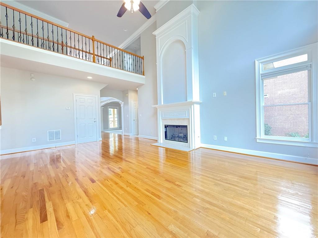 3500 Millwater Crossing Northeast Dacula, GA 30019 - Photo 20 of 72 a view of an empty room with window and fire place