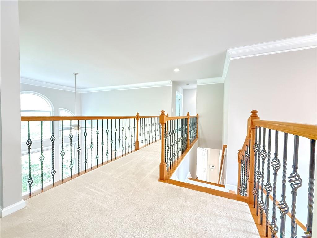 3500 Millwater Crossing Northeast Dacula, GA 30019 - Photo 27 of 72 a view of a hallway with a tv
