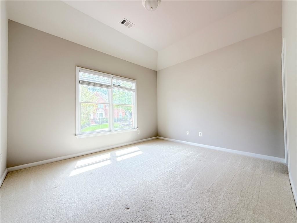 3500 Millwater Crossing Northeast Dacula, GA 30019 - Photo 55 of 72 an empty room with windows