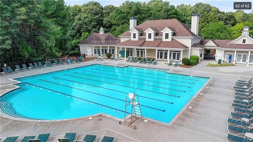 3500 Millwater Crossing Northeast Dacula, GA 30019 - Photo 71 of 72 a aerial view of a house with a swimming pool
