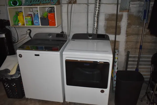 a utility room with dryer and washer