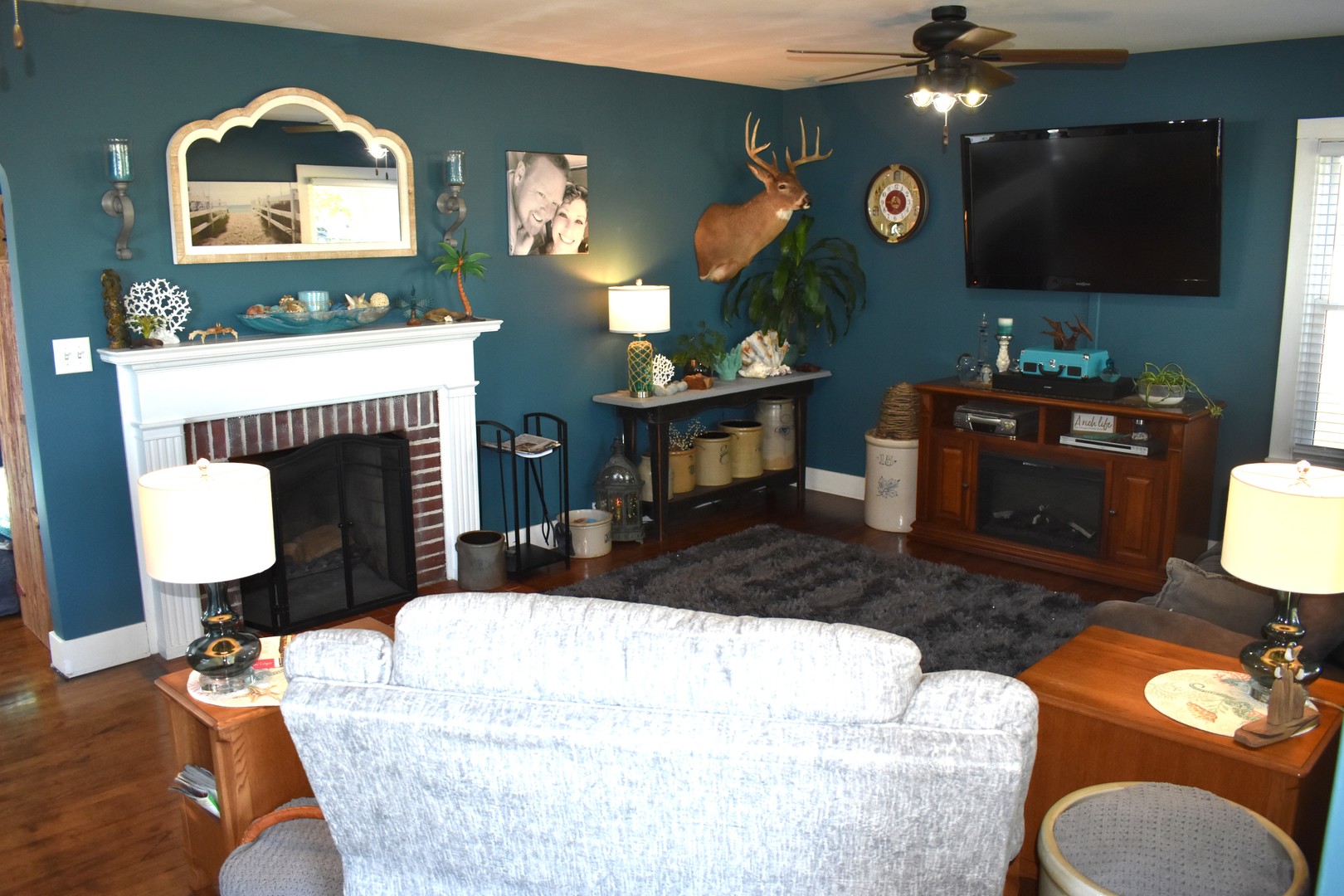 403 East Elm Street Buckley, IL 60918 - Photo 3 of 20 a living room with furniture and a fireplace