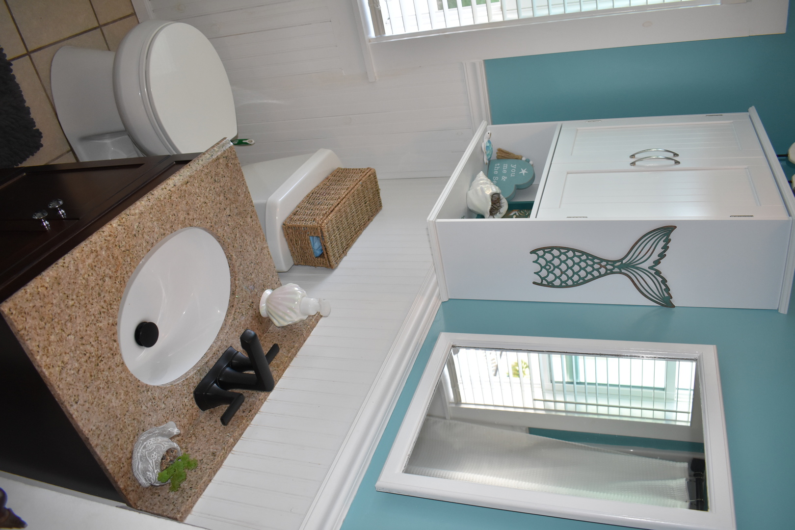 403 East Elm Street Buckley, IL 60918 - Photo 8 of 20 a bathroom with a sink and mirror